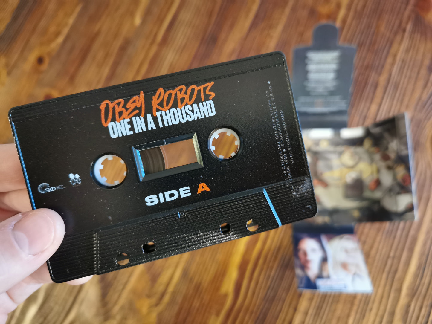 Obey Robots 'One In A Thousand' - Signed Cassette by Laura & Rat