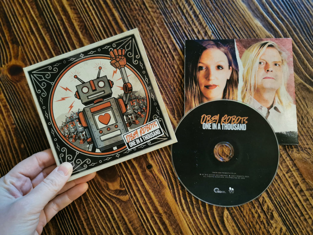 Obey Robots 'One In A Thousand' -  Signed CD by Laura & Rat
